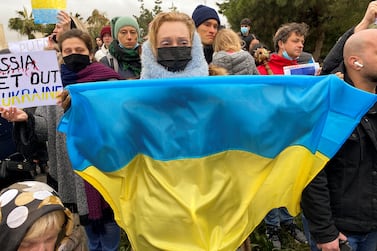 Ukrainians living in Jordan hold a protest against Russia's military operation in Ukraine, in Amman, Jordan February 25, 2022.  REUTERS / Muath Freij