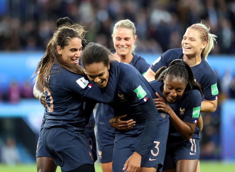 Soccer Football - Women's World Cup - Group A - France v Korea Republic - Parc des Princes, Paris, France - June 7, 2019  France's Wendie Renard celebrates scoring their third goal with Amel Majri and team mates  REUTERS/Lucy Nicholson