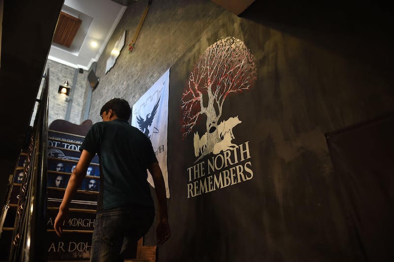 A man walks through the Game Of Thrones-themed restaurant named King's Landing in Islamabad. Farooq Naeem / AFP