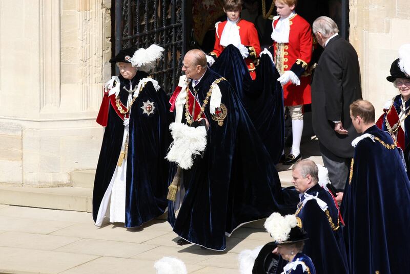 LONDON, UNITED KINGDOM - JUNE 13:  Queen Elizabeth II and Prince Philip, Duke of Edinburgh leave St George's Chapel at Windsor Castle after attending the annual Order of the Garter Service on June 13, 2011 in Windsor, England. The Order of the Garter is the senior and oldest British Order of Chivalry, founded by Edward III in 1348. Membership in the order is limited to the sovereign, the Prince of Wales, and no more than twenty-four members.  (Photo by Steve Parsons - WPA Pool/Getty Images)