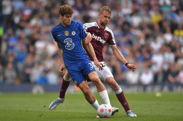 Marcos Alonso (L) of Chelsea in action against Tomas Soucek (R) of West Ham during the English Premier League soccer match between Chelsea FC and West Ham United in London, Britain, 24 April 2022.   EPA/VINCENT MIGNOTT EDITORIAL USE ONLY.  No use with unauthorized audio, video, data, fixture lists, club/league logos or 'live' services.  Online in-match use limited to 120 images, no video emulation.  No use in betting, games or single club / league / player publications
