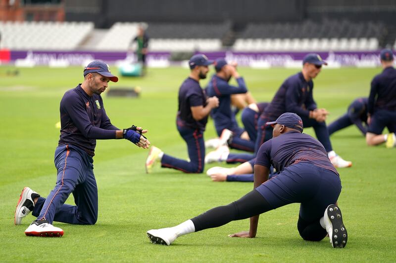 South Africa captain Keshav Maharaj, left, with teammates at Old Trafford. PA