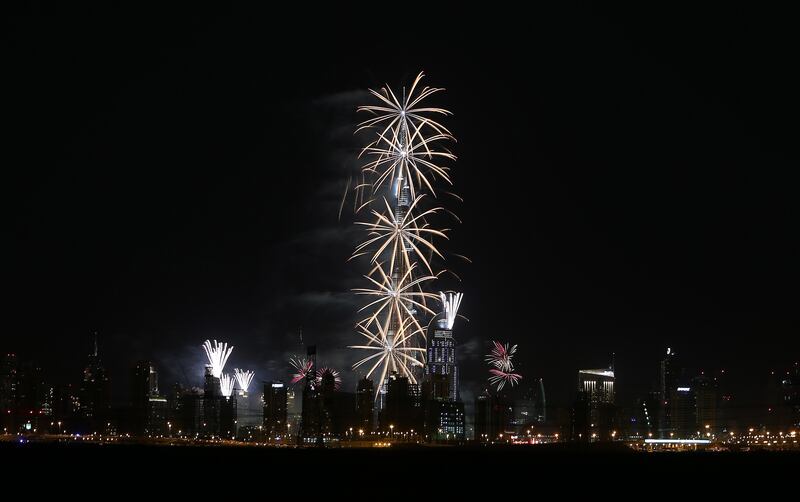 
DUBAI , UNITED ARAB EMIRATES Ð Dec 31 , 2013 : Fireworks display on Burj Khalifa for the new year celebration at Downtown Dubai in Dubai. ( Pawan Singh / The National ) For News
