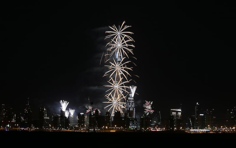 
DUBAI , UNITED ARAB EMIRATES Ð Dec 31 , 2013 : Fireworks display on Burj Khalifa for the new year celebration at Downtown Dubai in Dubai. ( Pawan Singh / The National ) For News
