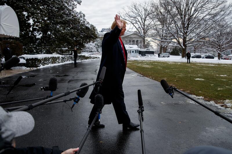 President Donald Trump walks off after speaking with reporters on the South Lawn of the White House before departing for the American Farm Bureau Federation's 100th Annual Convention in New Orleans, Monday, Jan. 14, 2019, in Washington. (AP Photo/ Evan Vucci)
