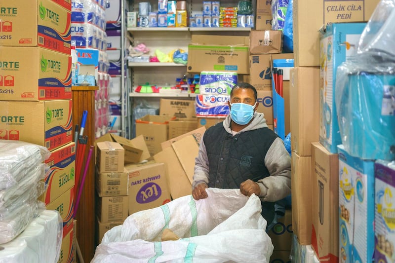 Mehmet, (35) the waste picker originally from Diyarbakir has been working as a wastepicker last 3 years in Istanbul. He is collecting cartoons from a cleaning store located in Kucukpazar, Istanbul Turkey 2021.