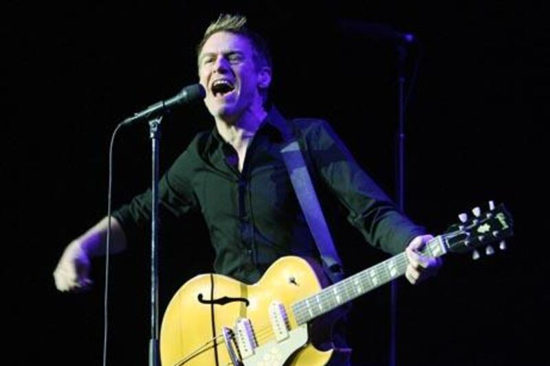 LAS VEGAS - AUGUST 02:  Music artist Bryan Adams performs as he opens for Rod Stewart at the MGM Grand Garden Arena August 2, 2008 in Las Vegas, Nevada. Adams is touring in support of his new album, "11."  (Photo by Ethan Miller/Getty Images)