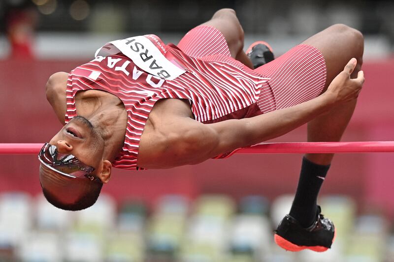 Qatar's Mutaz Essa Barshim competes in the men's high jump qualification during the Tokyo 2020 Olympic Games. AFP