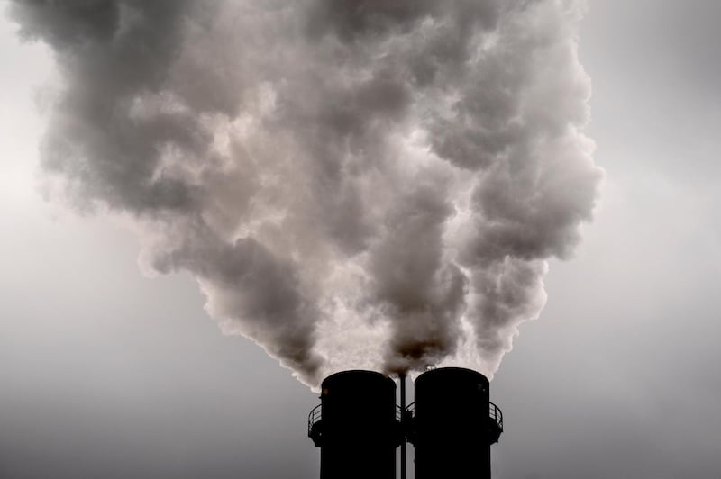 Smoke rises from a chimney of a Vattenfall heating power plant in Berlin, Germany, Tuesday, May 4. AP