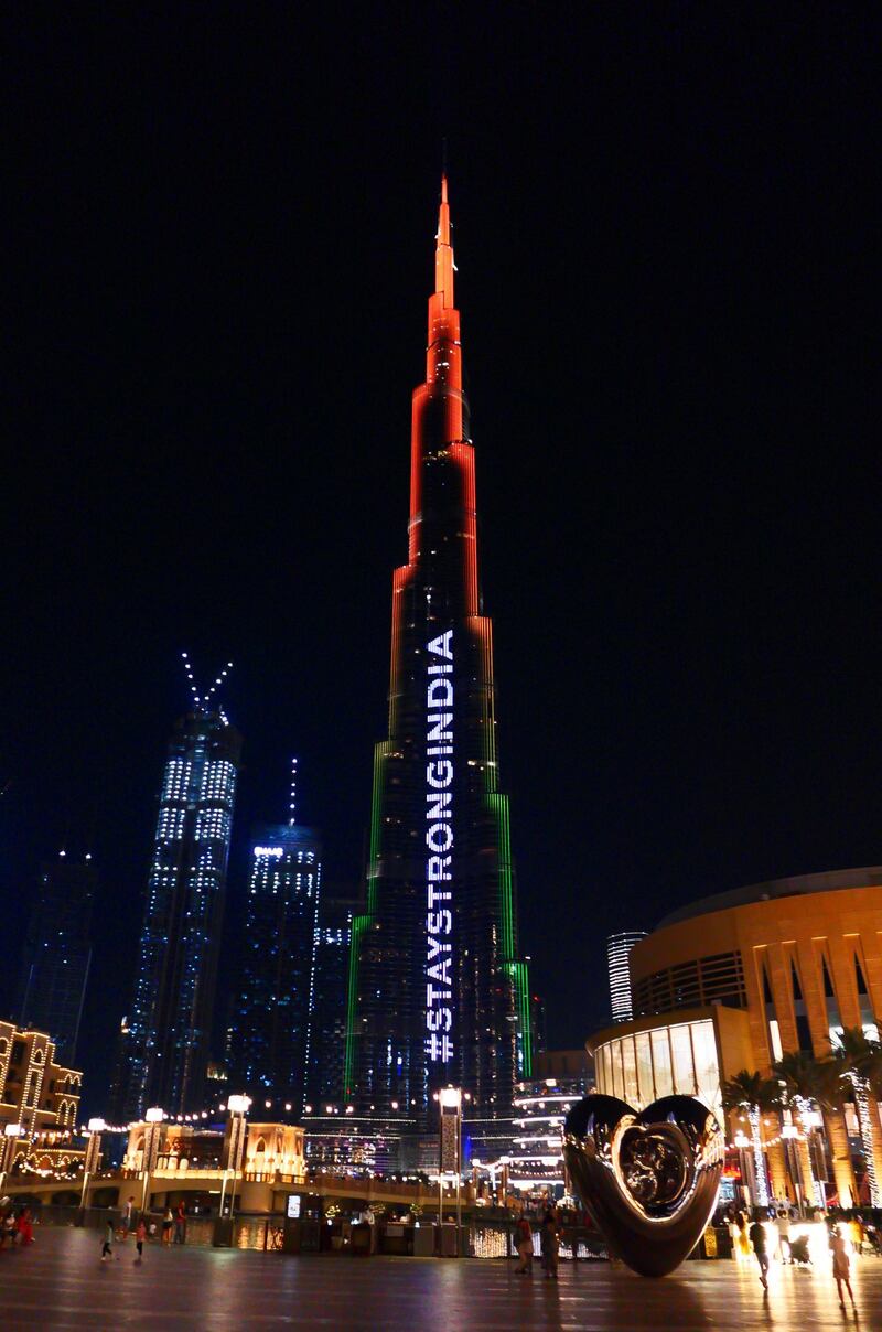 Indian flag projected on Burj Khalifa in Dubai in support during the COVID pandemic situation in India on April 25, 2021. Pawan Singh / The National. 