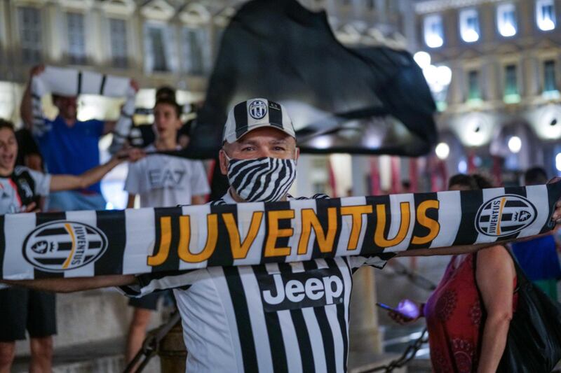 Juventus supporters celebrate. EPA