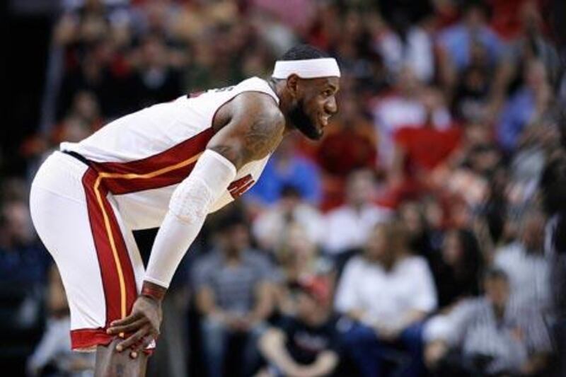 Miami Heat's LeBron James awaits the opening tipoff against the Memphis Grizzlies.