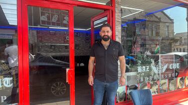 Rewa Ahmed, from Iraqi Kurdistan, the owner of BazCut barbers in Clacton-on-Sea. The National