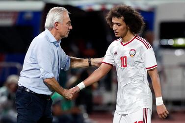 File photo of UAE manager Bert van Marwijk, left, and Omar Abdulrahman who are set compete in the upcoming Gulf Cup of Nations to be held later this month in Qatar. EPA