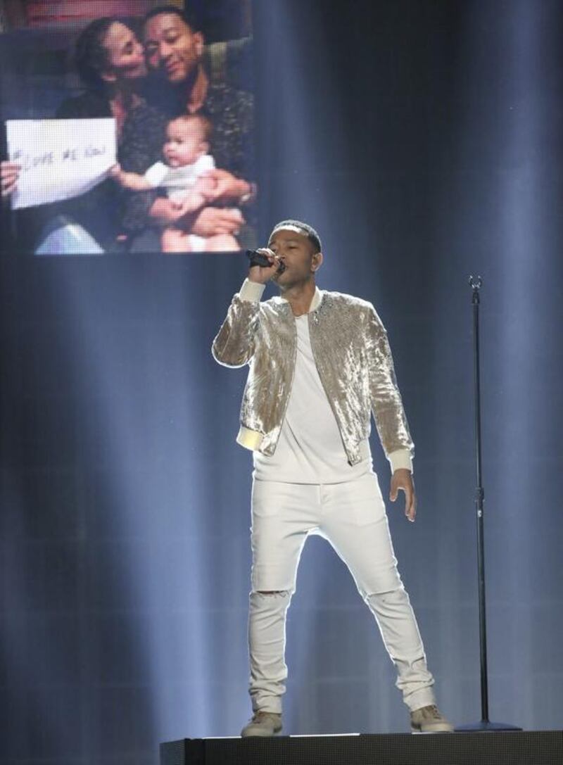John Legend performs Love Me Now at the American Music Awards. Matt Sayles / Invision / AP