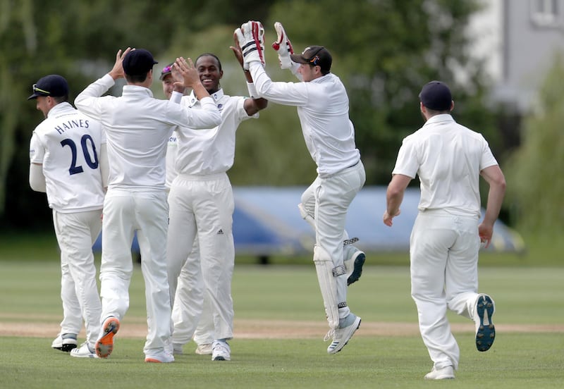 Archer celebrates one of his six wickets. PA Photo