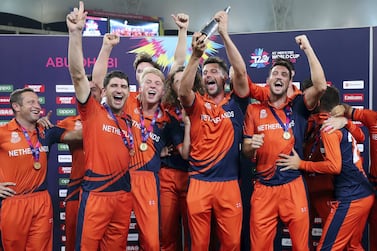 The Netherlands celebrate winning the T20 World Cup Qualifier final against Papua New Guinea at the Dubai International Cricket Stadium. Chris Whiteoak / The National