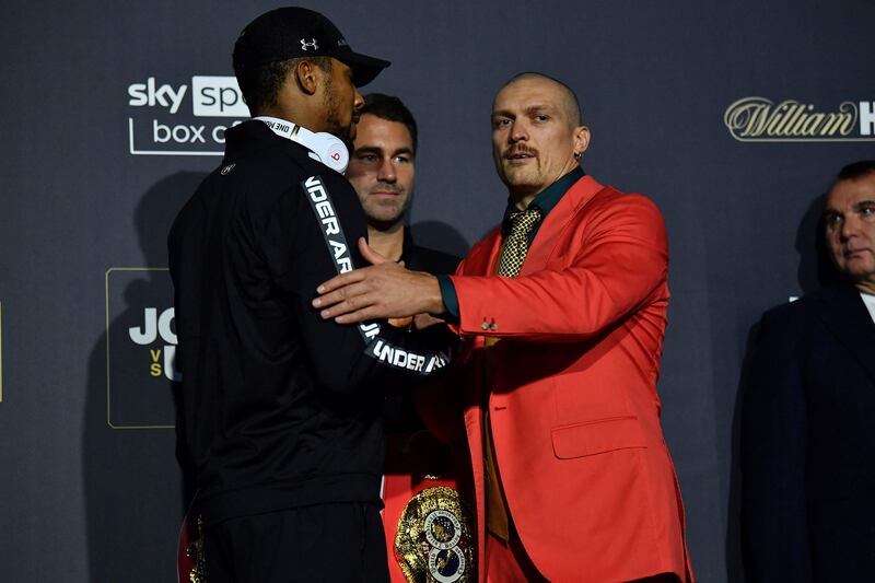 Anthony Joshua and Ukraine's Oleksandr Usyk. AFP