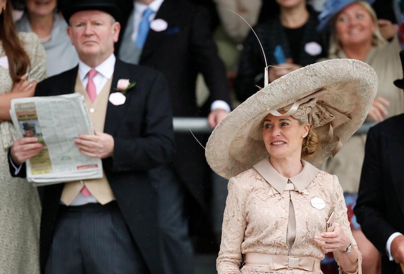 Racegoers are seen during the Duke Of Edinburgh Stakes. Reuters