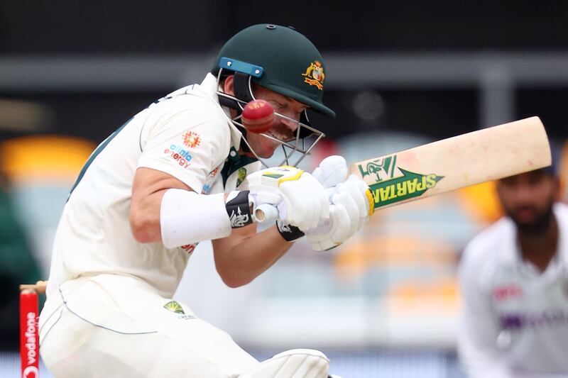 Australia batsman David Warner tries to avoid a bouncer from India's Shardul Thakur. AFP