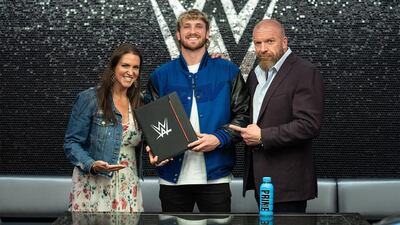 Stephanie McMahon with influencer Logan Paul and executive vice president Paul 'Triple H' Levesque. She quit in January when her father returned after misconduct claims. Photo: WWE