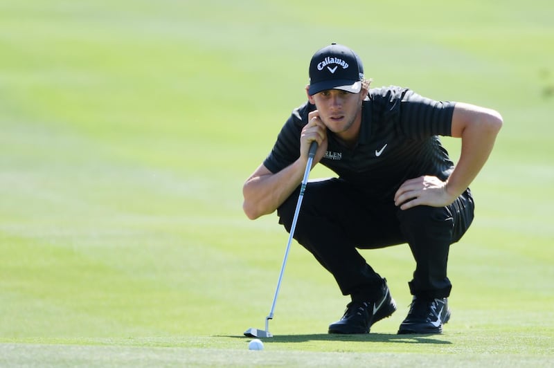 ABU DHABI, UNITED ARAB EMIRATES - JANUARY 19:  Thomas Pieters of Belgium lines up a putt on the eighth green during round two of the Abu Dhabi HSBC Golf Championship at Abu Dhabi Golf Club on January 19, 2018 in Abu Dhabi, United Arab Emirates.  (Photo by Ross Kinnaird/Getty Images)