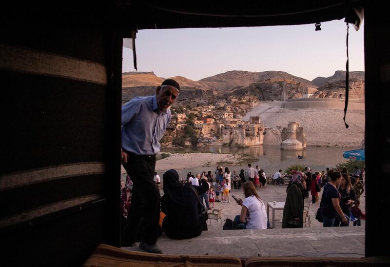 People sitting  near Tigris (Dicle) river in Hasankeyf, an ancient city with roots going back 10,000 years and located along the Tigris (Dicle) River in south-east Turkey's Batman province.   EPA