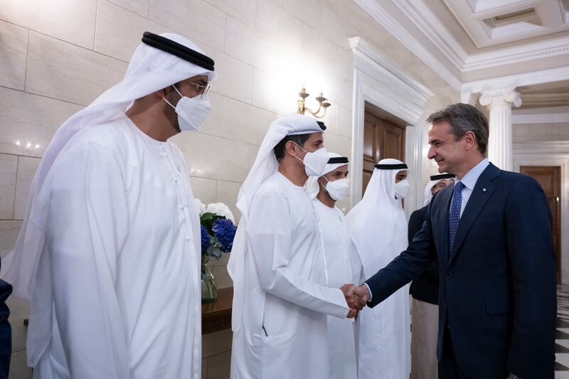 Ali Al Shamsi, deputy secretary general of the Supreme National Security Council, is received by Mr Mitsotakis alongside Dr Sultan Al Jaber, Minister of Industry and Advanced Technology (L); Sheikh Zayed bin Mohamed (3rd L), Sheikh Mohammed bin Hamad, Adviser for Special Affairs at the Presidential Court (4th L); and Deputy Prime Minister and Minister of Presidential Affairs (5th L). 
