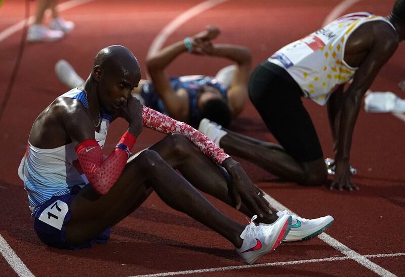 Sir Mo Farah at the end of the race. PA