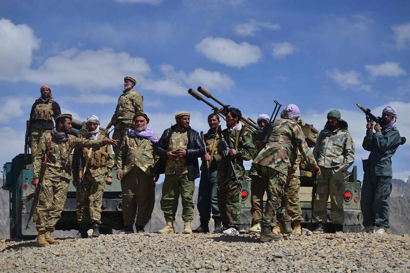 Afghan resistance fighters and anti-Taliban troops stand guard at an outpost in Kotal-e Anjuman, Panjshir province. AFP