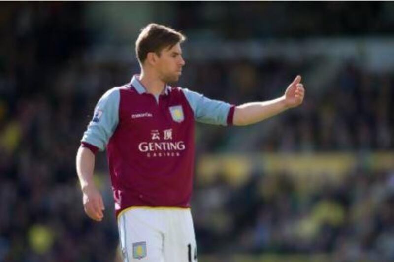 Australian Brett Holman will be joining Al Nasr after falling out favour with manager Paul Lambert at Aston Villa.
