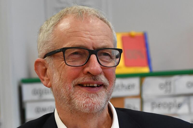 MORCAMBE, ENGLAND - DECEMBER 10: Labour leader Jeremy Corbyn smiles as he participates in an arts and crafts session while visiting Sandylands Community Primary School on December 10, 2019 in Morcambe, England. Mr Corbyn will address Labour activists in the North West as part of his final campaign tour before polling day. (Photo by Anthony Devlin/Getty Images)