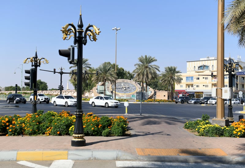 The renowned clock structure was relocated to the Hessa Bint Mohamed Street and Zayed Bin Sultan Street intersection. Photo: Khushnum Bhandari / The National
