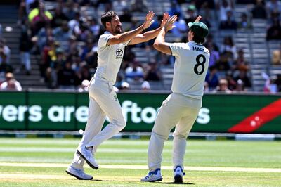 Mitchell Starc, left, supported Pat Cummins with four wickets in the second innings. AFP