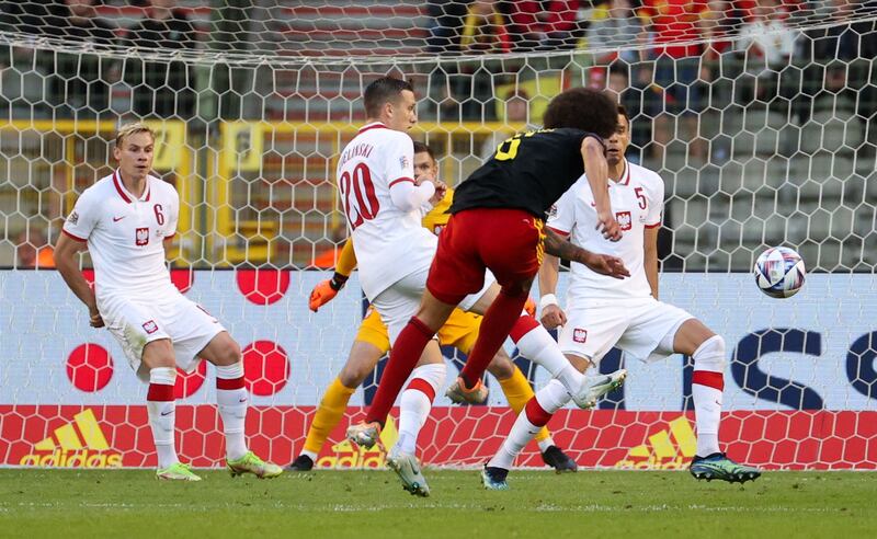 Belgium's Axel Witsel shoots to scores Bellgium's first goal against Poland. AFP