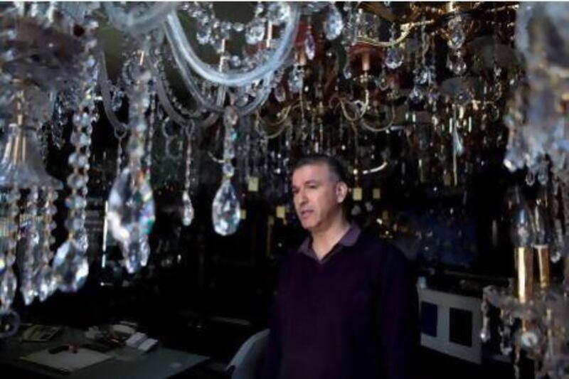 Ammar Al Hayek, the owner of Hayek Electric Company, a lighting store at the Mina Street in Abu Dhabi, hopes that in time he will also be able to bring his family lighting business back to its pre-tunnel levels Silvia Razgova / The National