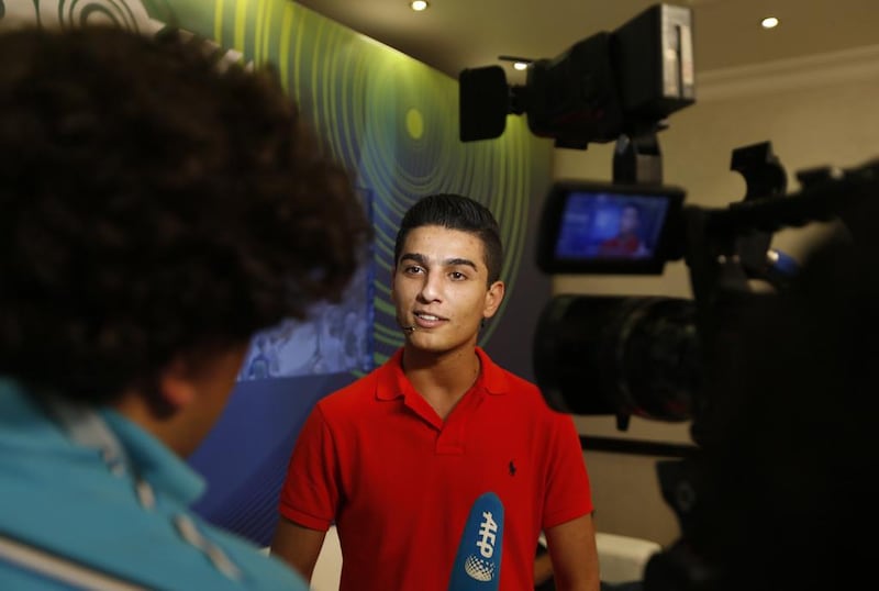 Mohammed Assaf in the studio before recording his new song which will be performed at the opening cermony of the 65th FIFA congess event in Sao Paulo, Brazil. AFP  

