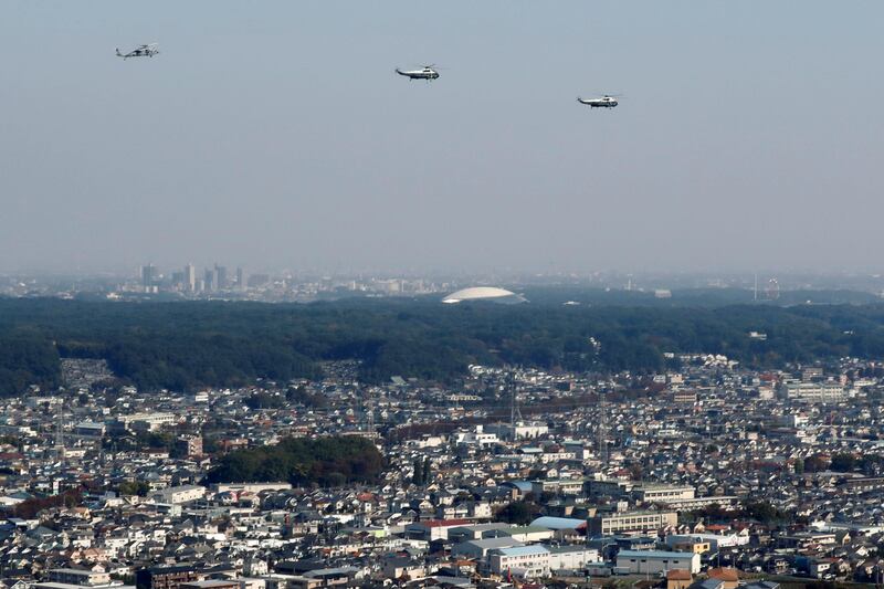 US president Donald Trump flies via Marine One helicopter over the Tokyo suburbs to meet Japan's prime minister Shinzo Abe at Kasumigaseki Country Club in Kawagoe. Jonathan Ernst / Reuters