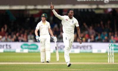 England's Jofra Archer celebrates the wicket of Australia's Usman Khawaja during day five of the Ashes Test match at Lord's, London. PRESS ASSOCIATION Photo. Picture date: Sunday August 18, 2019. See PA story CRICKET England. Photo credit should read: John Walton/PA Wire. RESTRICTIONS: Editorial use only. No commercial use without prior written consent of the ECB. Still image use only. No moving images to emulate broadcast. No removing or obscuring of sponsor logos.