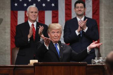 US President Donald Trump delivers the 2018 State of the Union address as Vice President Mike Pence and then speaker of the House of Representatives Paul Ryan look on. AFP
