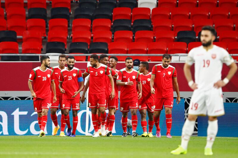 Oman's players after the team's second goal against Bahrain at the Ahmed bin Ali Stadium in Ar Rayyan.