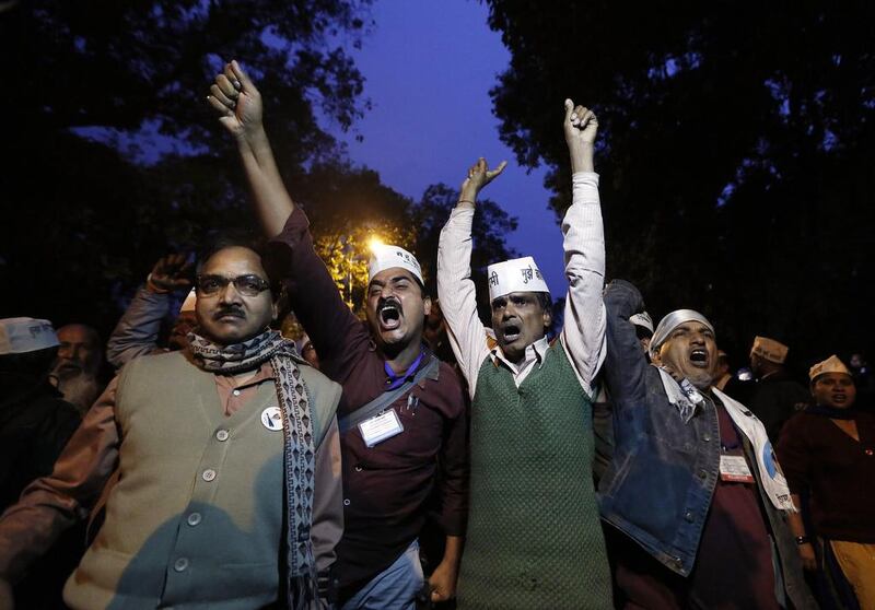 Supporters of the Aam Aadmi Party shout slogans in New Delhi. Adnan Abidi / Reuters