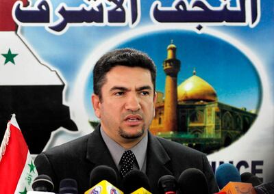 FILE - In this Feb. 5, 2005 file photo, then Governor of Najaf Adnan Al-Zurfi gives a news conference in Najaf, Iraq. On Tuesday, March 17, 2020, Iraq's president named Al-Zurfi as prime minister-designate, following weeks of political infighting and a looming crisis amid a global pandemic.Â His naming comes hours before a COVID-19 curfew is set to take hold in the capital, Baghdad, as Iraq struggles to contain the spread of the virus. For most people, the new coronavirus causes only mild or moderate symptoms. For some it can cause more severe illnessÂ  (AP Photo/Hadi Mizban, File)
