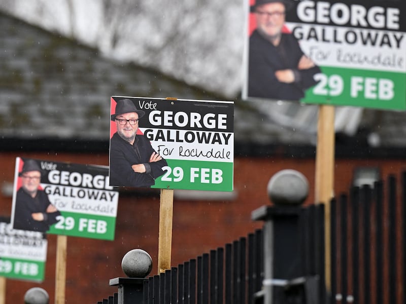 Promotional signs in Rochdale for Workers Party candidate George Galloway. AFP