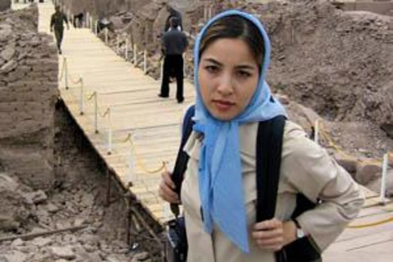 US-Iranian journalist Roxana Saberi poses for a photograph in Bam, 1,250 km (776 miles) southeast of Tehran March 31, 2004.  Iran's judiciary has charged detained Iranian-American freelance journalist Roxana Saberi with espionage, the ISNA news agency reported on April 8, 2009. ISNA, quoting a judge who is the deputy head of Iran's prosecutor's office, said Saberi had "accepted" the accusation.  Picture taken March 31, 2004.  REUTERS/Stringer (IRAN POLITICS CONFLICT SOCIETY) *** Local Caption ***  TEH08_IRAN-USA-JOUR_0408_11.JPG