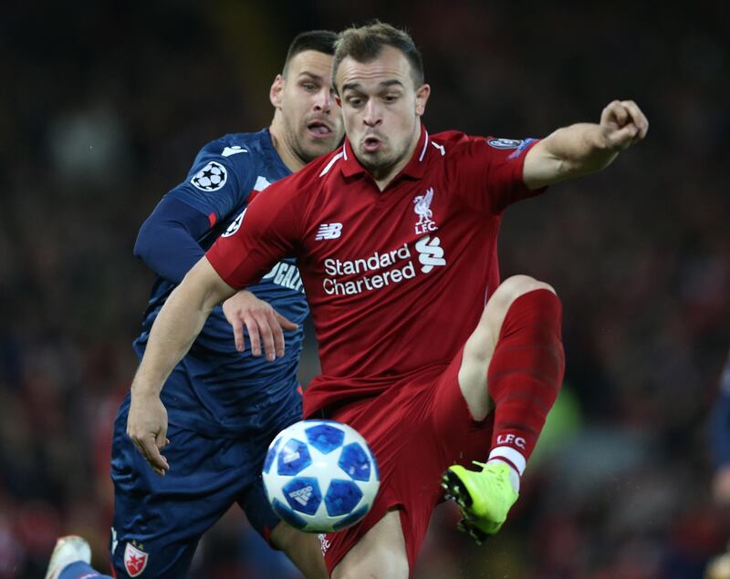 Liverpool's Xherdan Shaqiri in action with Red Star Belgrade's Marko Gobeljic. EPA