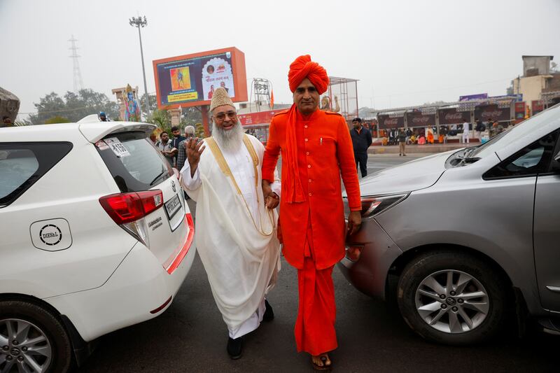 A Muslim cleric and a Hindu priest arrive to attend the inauguration ceremony. Reuters 