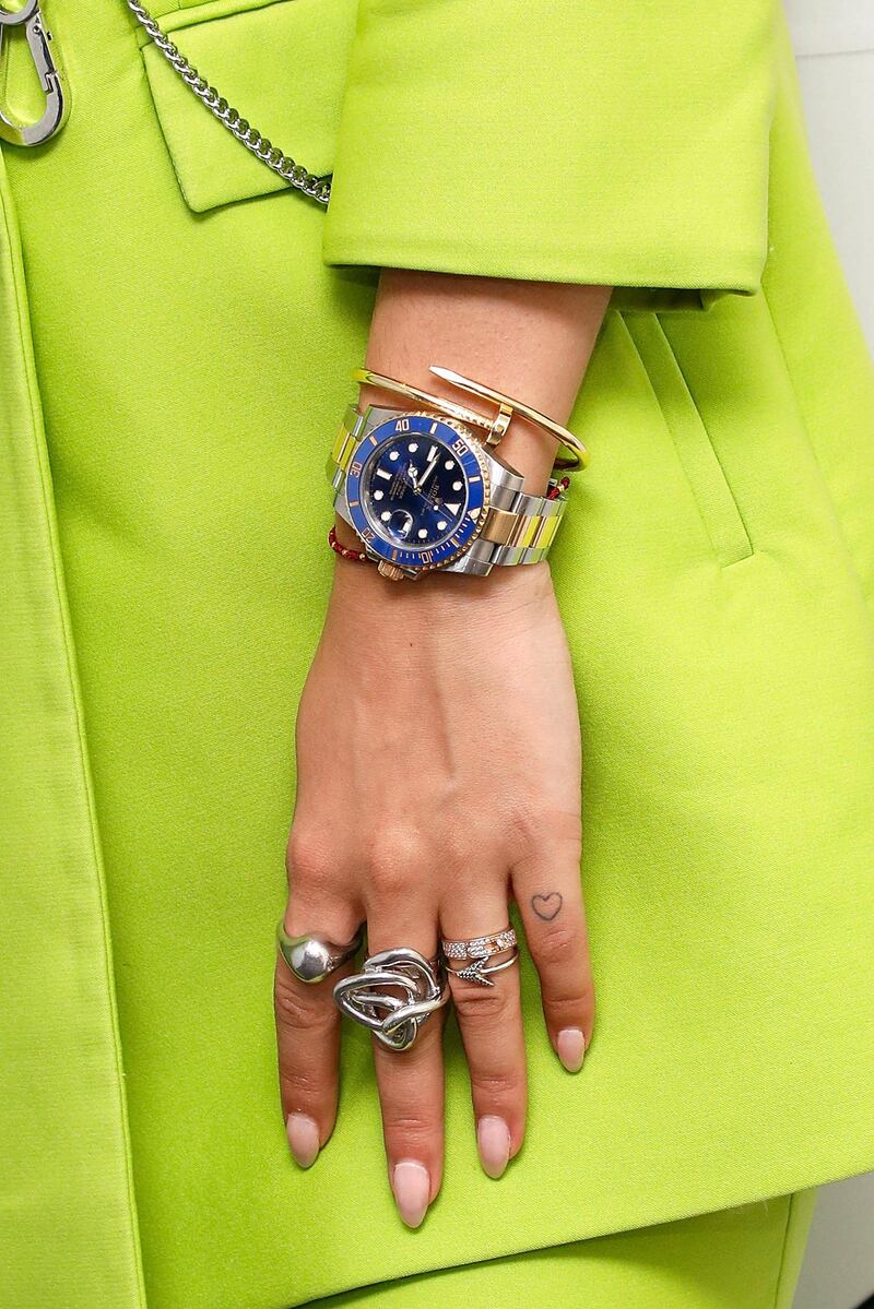 NEW YORK, NY - JUNE 19: Rita Ora, watch detail, ring detail, tattoo detail, visits the Music Choice studios on June 19, 2017 in New York City.  (Photo by Taylor Hill/Getty Images)