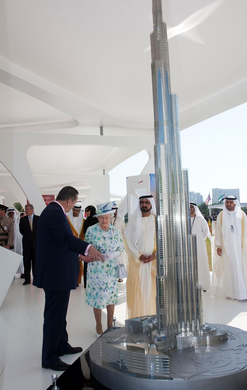 ABU DHABI, UAE - NOVEMBER 25:  Britain's Queen Elizabeth accompanied by HRH The Duke of Edinburgh, Prince Philip in Abu Dhabi on the State Visit to the UAE. The Queen accompanied by HH Sheikh Mohammed Bin Rashid Al Maktoum Vice-President of the UAE and ruler of Dubai unveils the design of the Zayed National Museum design.
Viewing the Burj Khalifa tower *** Local Caption ***  IJP-25-11-10-Queen-AD-Museum-60.jpg