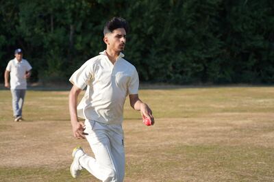 An Afghan teenager who arrived in the UK last summer plays in a cricket match in Fulham. Victoria Pertusa / The National